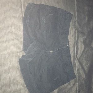 Distressed black shorts